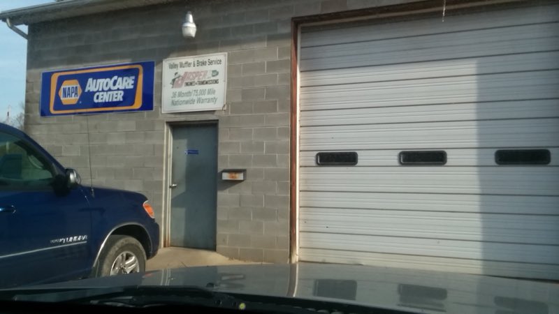 Valley Muffler & Brake shop building and service bay